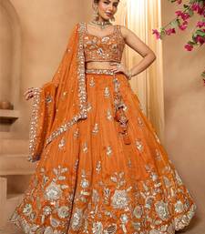 Women's Rust Orange Embroidered Georgette Lehenga Choli with Matching Dupatta