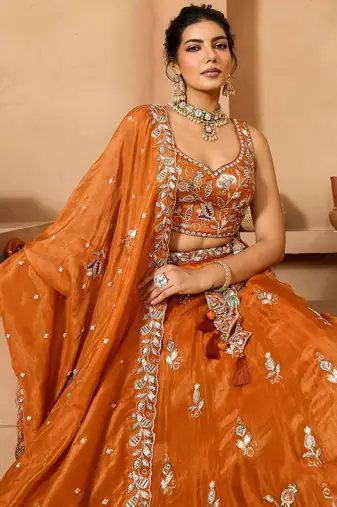 Women's Rust Orange Embroidered Georgette Lehenga Choli with Matching Dupatta