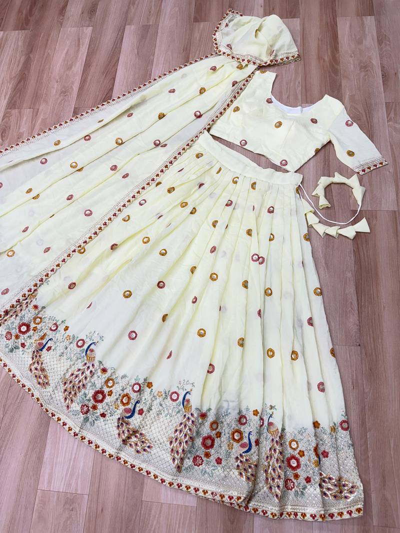Off-White Silk Semi Stitched Lehenga Choli with Thread Embroidery & Zari Work