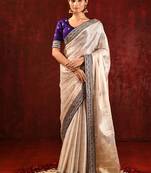 Light gold purple embroidered tissue saree set