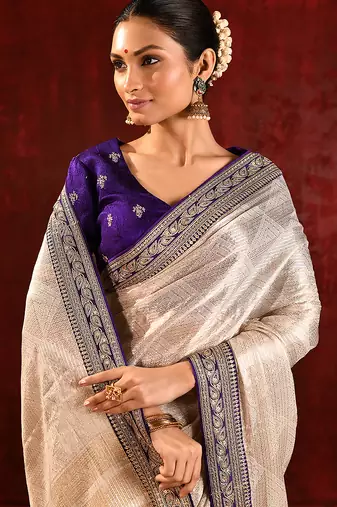 Light gold purple embroidered tissue saree set