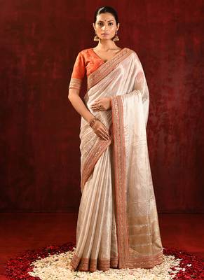 Light gold orange embroidered tissue saree set 1