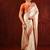 Light gold orange embroidered tissue saree set