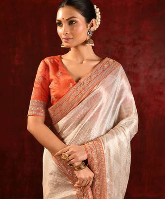 Light gold orange embroidered tissue saree set 4