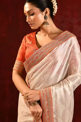Light gold orange embroidered tissue saree set