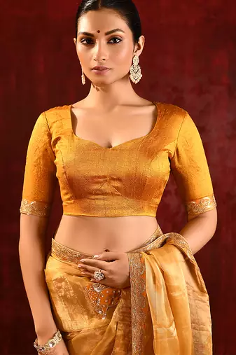 Mustard yellow embroidered tissue saree set