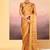 Classic gold embroidered tissue saree set