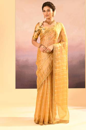 Golden yellow embroidered tissue saree set