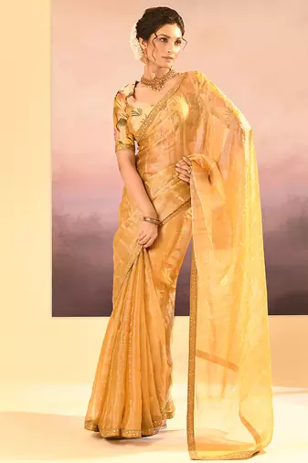 Golden yellow embroidered tissue saree set