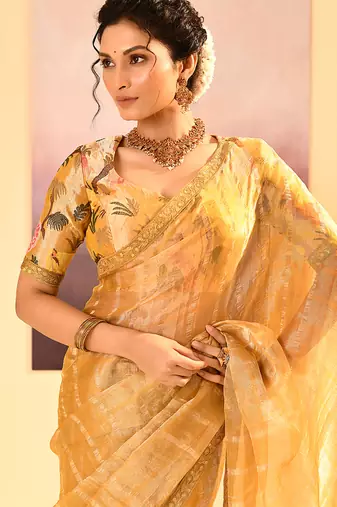 Golden yellow embroidered tissue saree set
