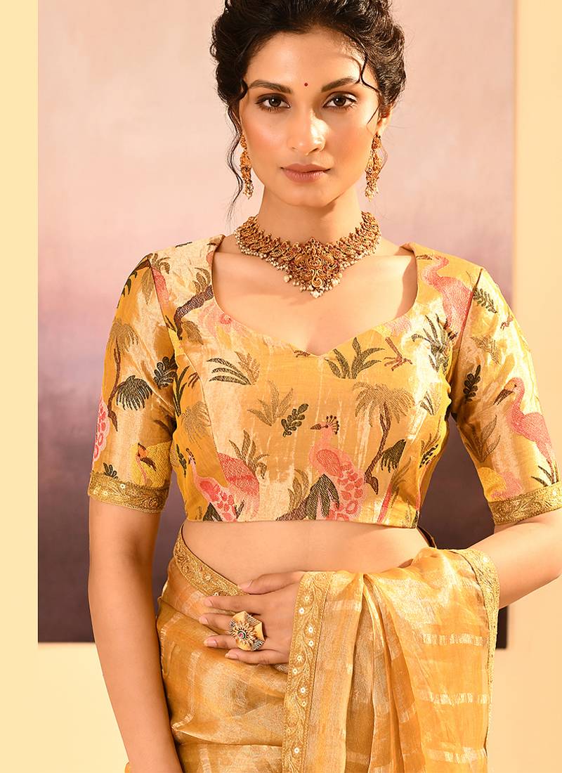 Golden yellow embroidered tissue saree set