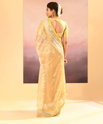 Yellow embroidered tissue saree set 5