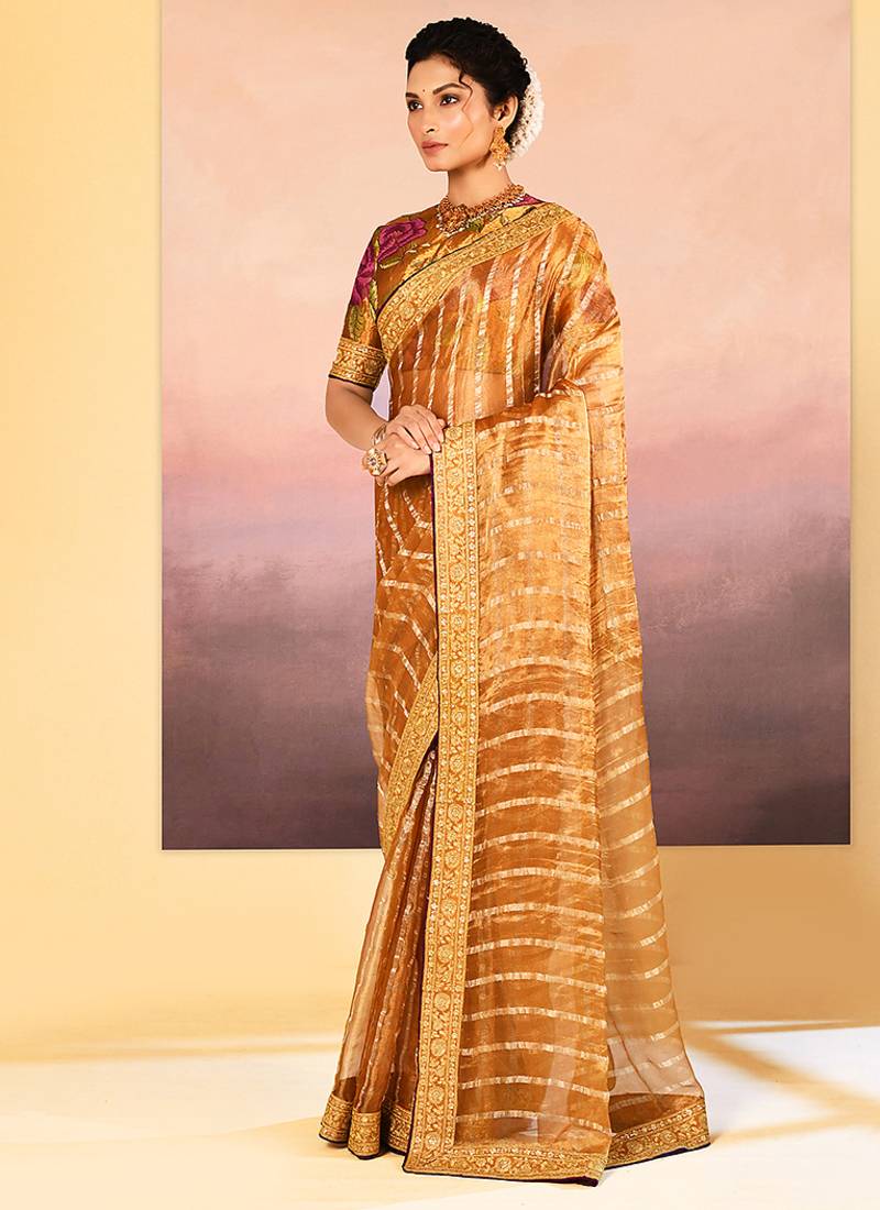 Golden embroidered tissue saree set