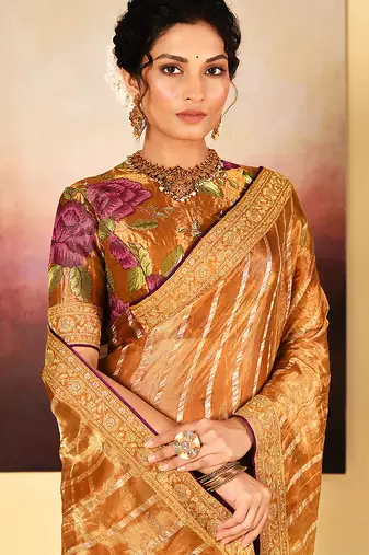 Golden embroidered tissue saree set