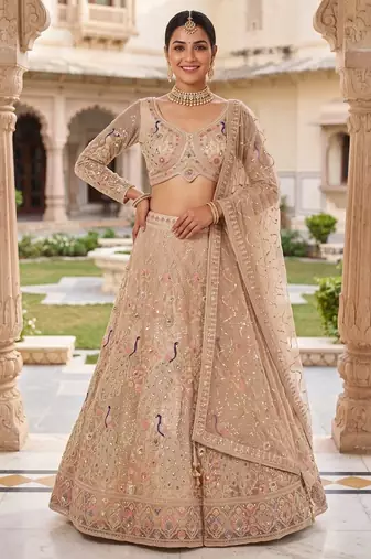 Elegant Floral Patterned Net Lehenga Set in Beige with Embellished Blouse and Dupatta with light gold colour.
