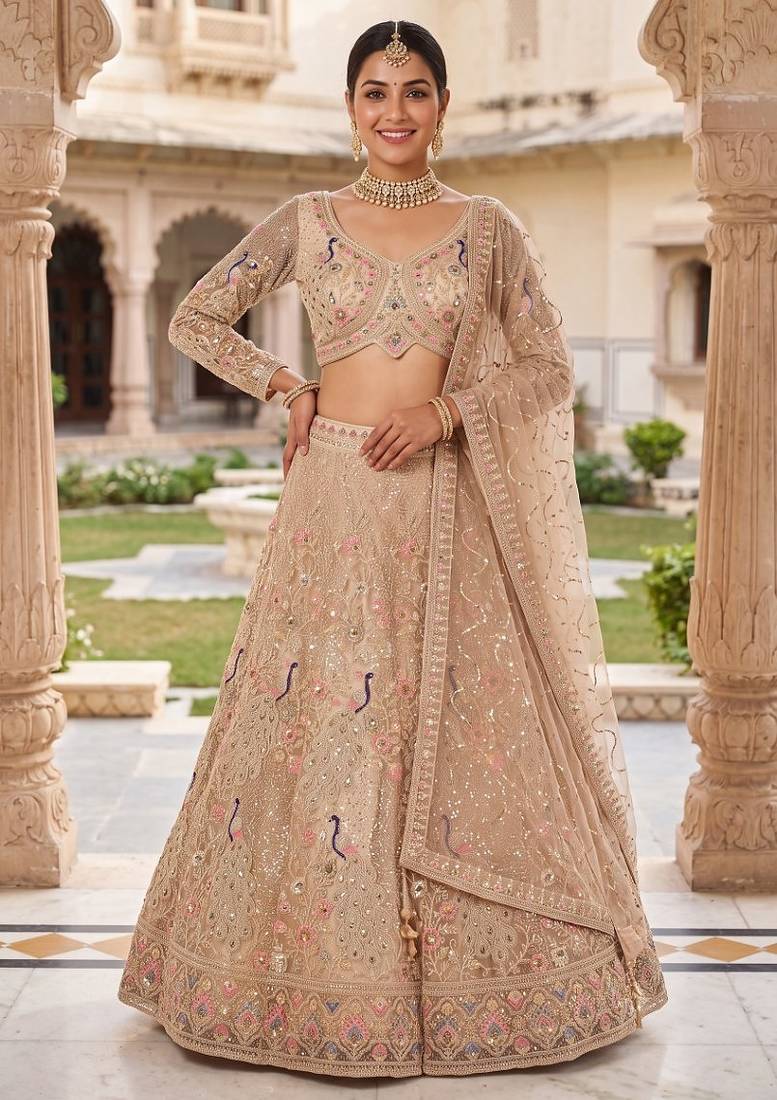 Elegant Floral Patterned Net Lehenga Set in Beige with Embellished Blouse and Dupatta with light gold colour.