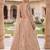 Elegant Floral Patterned Net Lehenga Set in Beige with Embellished Blouse and Dupatta with light gold colour.