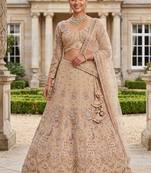 Light skin colour Beige Embroidered Bridal Lehenga Choli with Pastel Floral Motifs and Detailed Zardosi Work