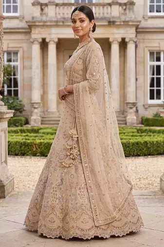 Light skin colour Beige Embroidered Bridal Lehenga Choli with Pastel Floral Motifs and Detailed Zardosi Work