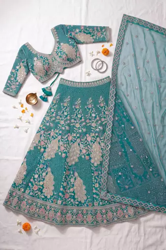 Elegant Teal Blue Embroidered Lehenga Choli with Peacock Motif and Matching Dupatta