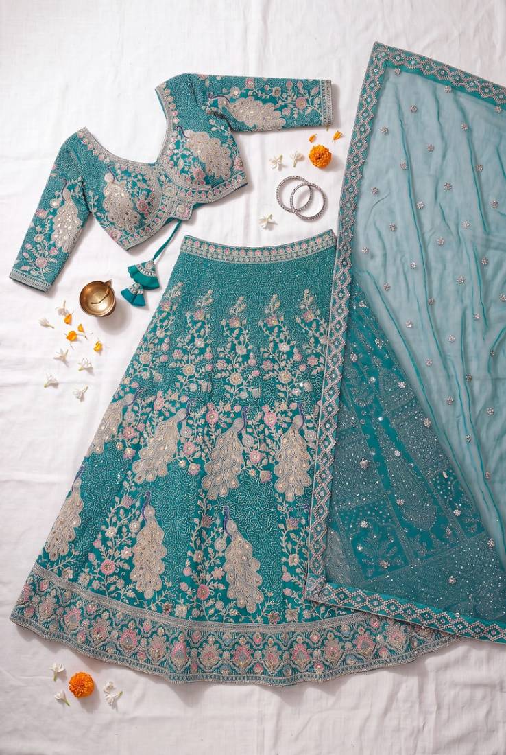 Elegant Teal Blue Embroidered Lehenga Choli with Peacock Motif and Matching Dupatta