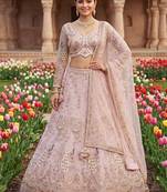 Designer Embroidered Pastel Pink Lehenga Choli Set with Peacock Motif and Net Dupatta for Wedding and Festive Wear