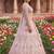 Designer Embroidered Pastel Pink Lehenga Choli Set with Peacock Motif and Net Dupatta for Wedding and Festive Wear