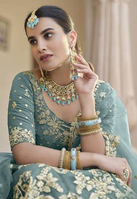 Turquoise sequins and dori embroidered soft net festive & party wear stitched lehenga 4