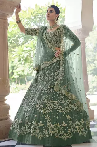 Light green sequins and dori embroidered soft net festive & party wear stitched lehenga choli
