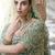 Light green sequins and dori embroidered soft net festive & party wear stitched lehenga choli