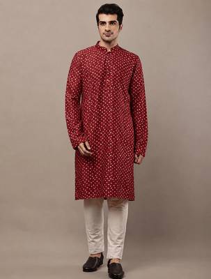 red printed kurta with cream pyjama & all-over ethnic motifs set with cream payjama 1
