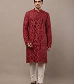  red printed kurta with cream pyjama & all-over ethnic motifs set with cream payjama