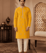 Men's mustard yellow woven ethnic kurta with cream pyjama set