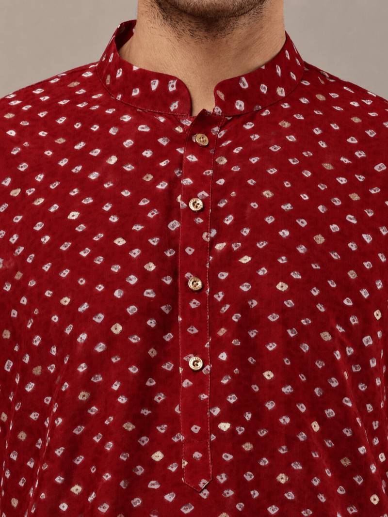  red printed kurta with cream pyjama & all-over ethnic motifs set with cream payjama