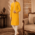 Men's mustard yellow woven ethnic kurta with cream pyjama set