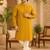 Yellow ethnic printed kurta with cream churidar set