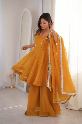 yellow silk blend  readymade suit with zarkhand & lace work