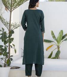 Green premium designer festive wear readymade suit