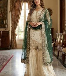 white&d green silk blend  readymade suit with embroidery & sequence work