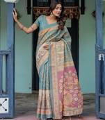 Elegant aqua blue handloom saree with traditional floral weaving with blouse