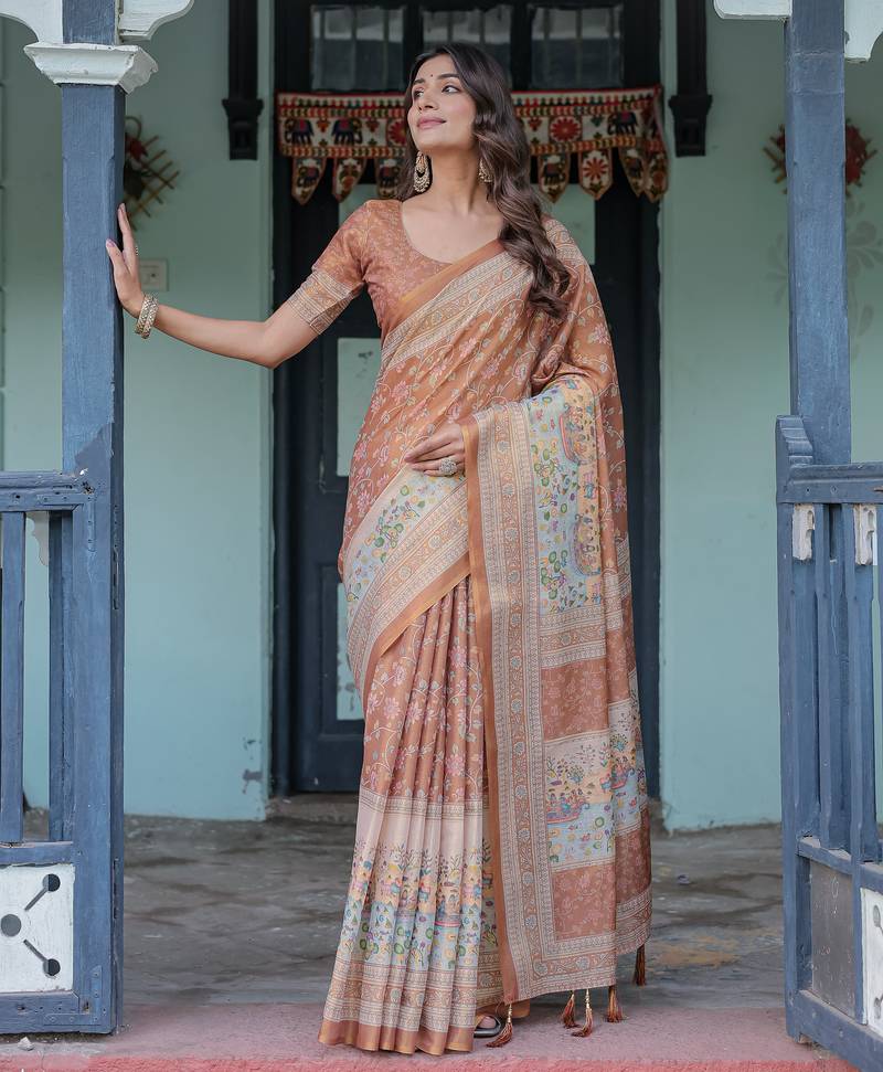 Elegant peach blush handloom saree with floral & heritage-inspired prints with blouse