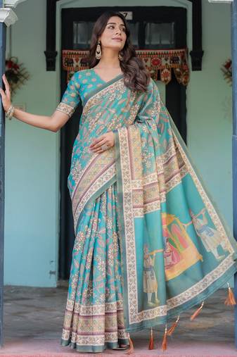 Graceful teal blue handloom saree with floral heritage art with blouse