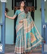 Graceful teal blue handloom saree with floral heritage art with blouse
