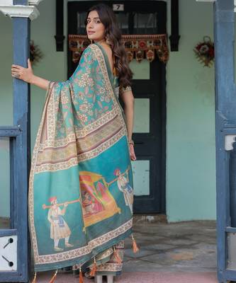 Graceful teal blue handloom saree with floral heritage art with blouse 2
