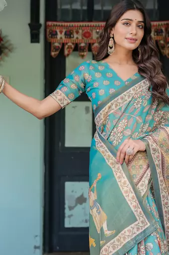Graceful teal blue handloom saree with floral heritage art with blouse