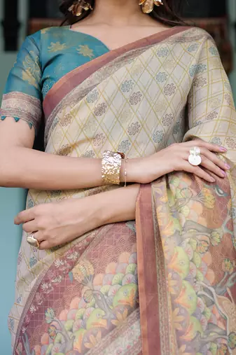 Elegant ivory beige handloom saree with nature-inspired artistic pallu with blouse