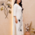 Women white & black floral embroidered kurta with trousers