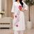 Women white & red floral embroidered kurta with trousers
