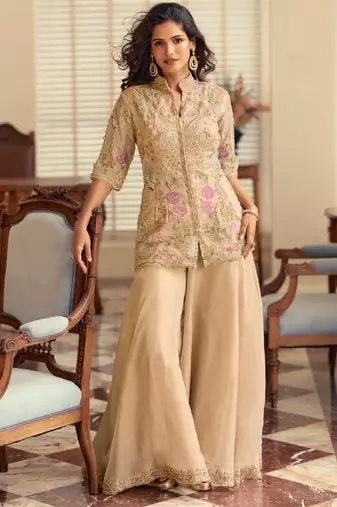 Cream silk blend readymade suit with beads & embroidery work