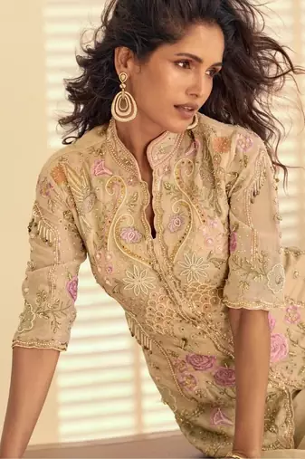 Cream silk blend readymade suit with beads & embroidery work